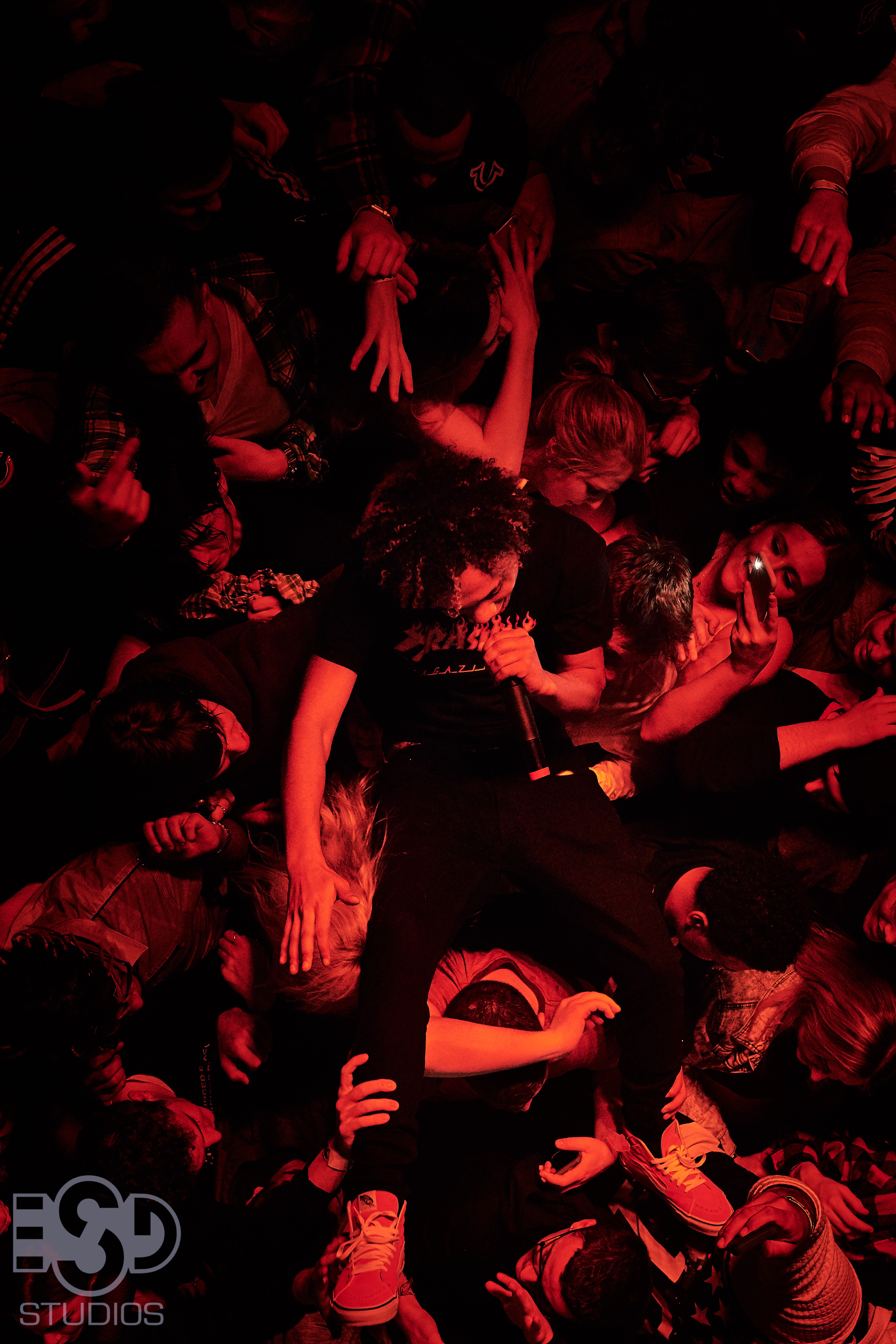 Mosh pit under red lights