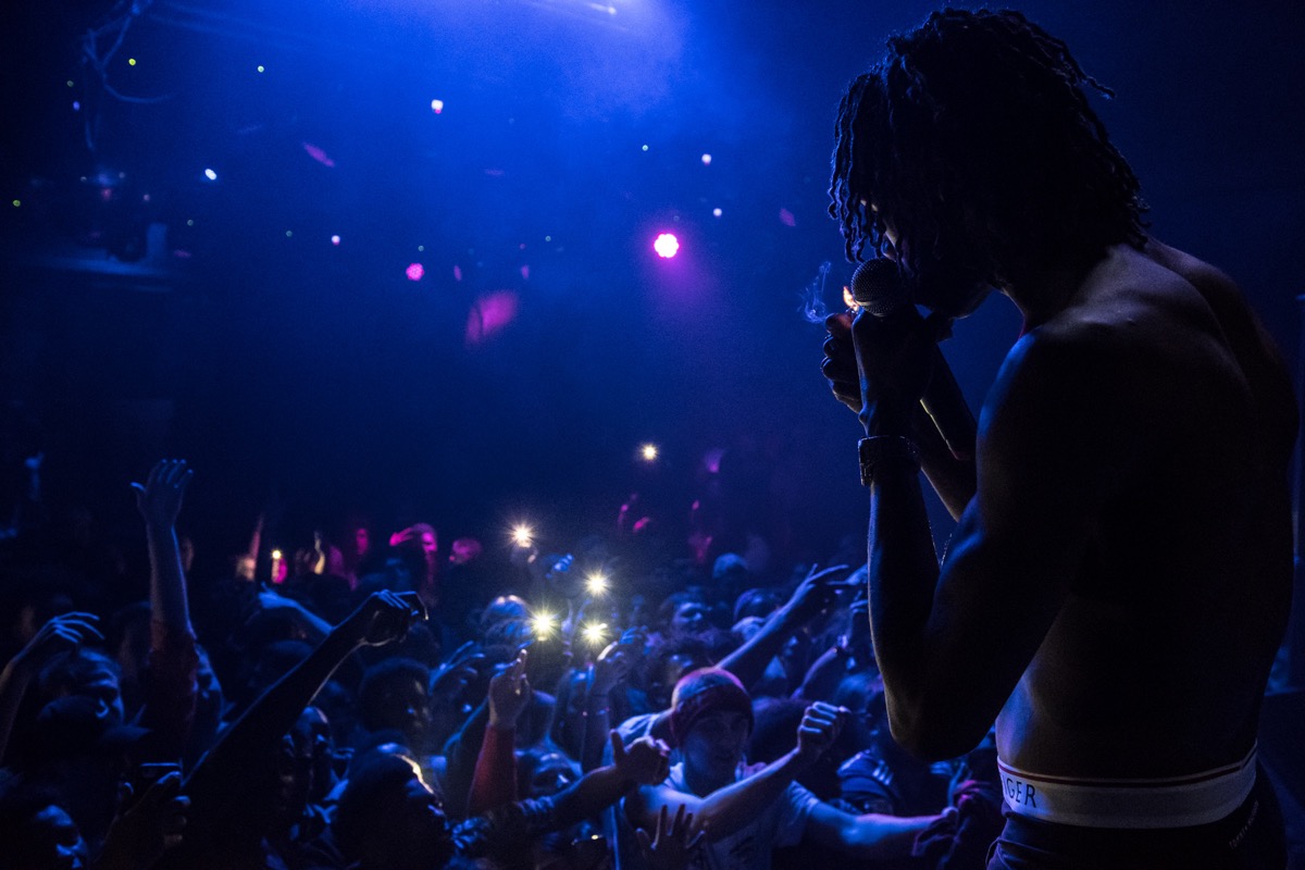 Smokepurpp performing with blue lights